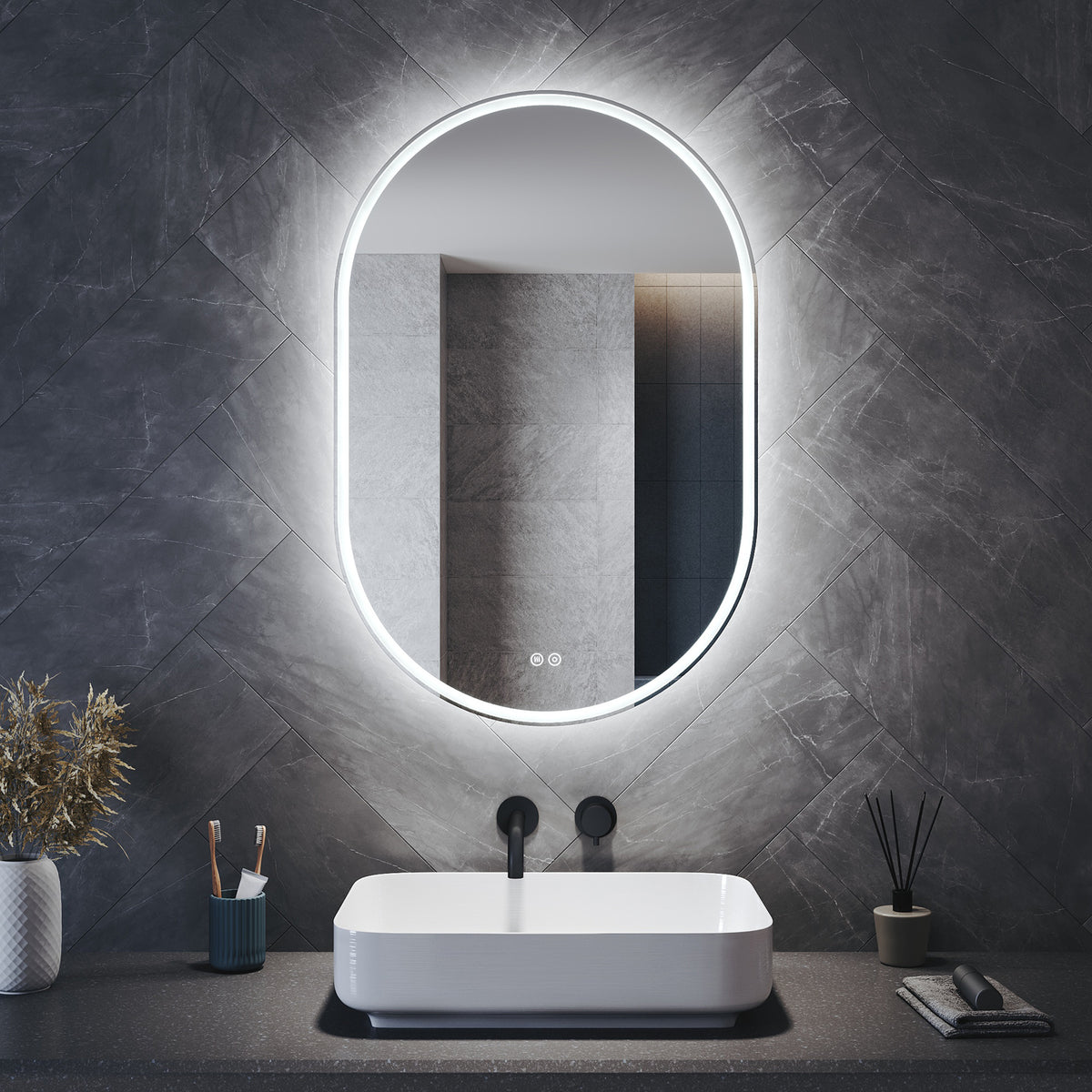 Oval LED bathroom mirror with anti-fog feature and shaver outlet, 800x500x35mm