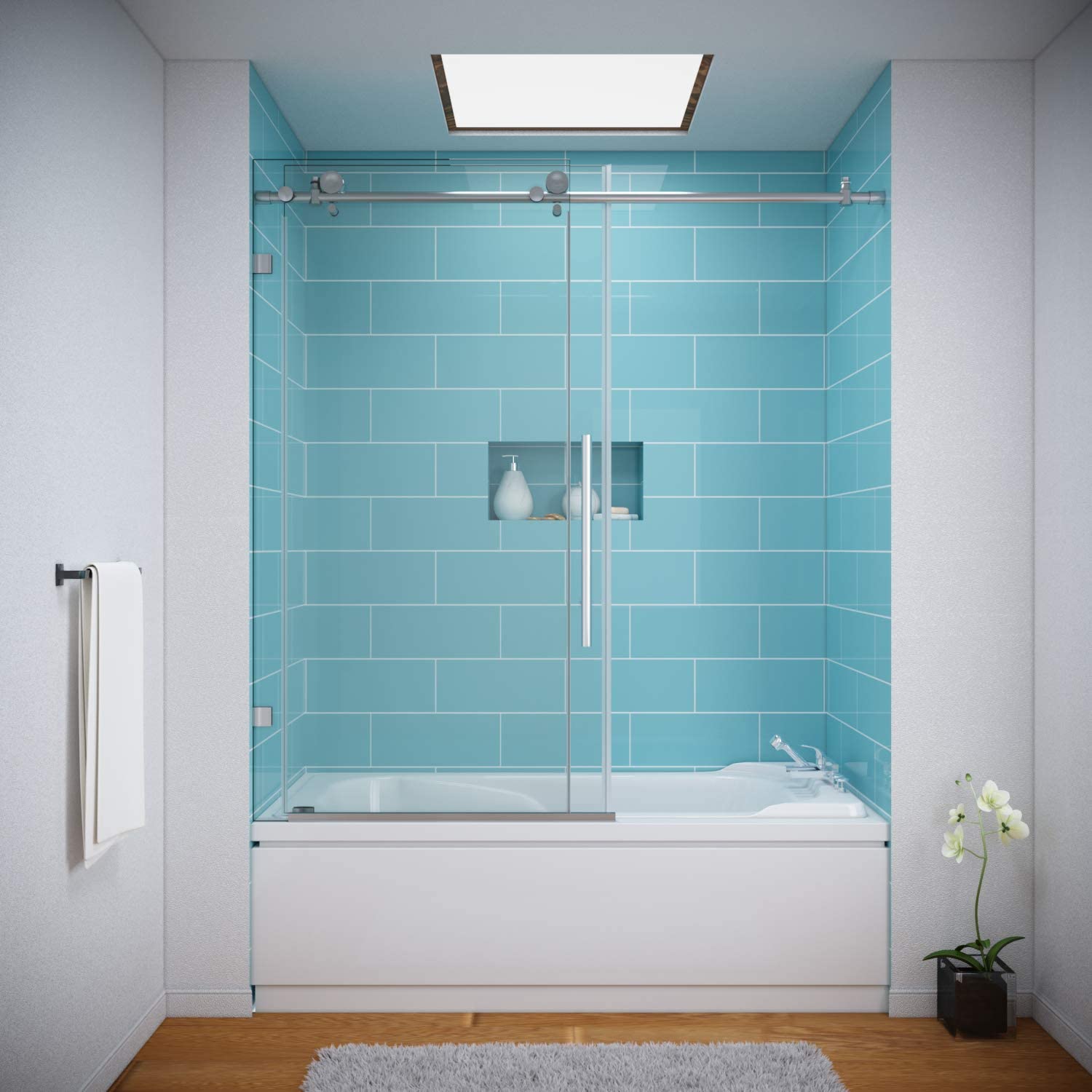 Modern bathroom featuring a frameless glass shower enclosure with turquoise tiles and a minimalistic design.