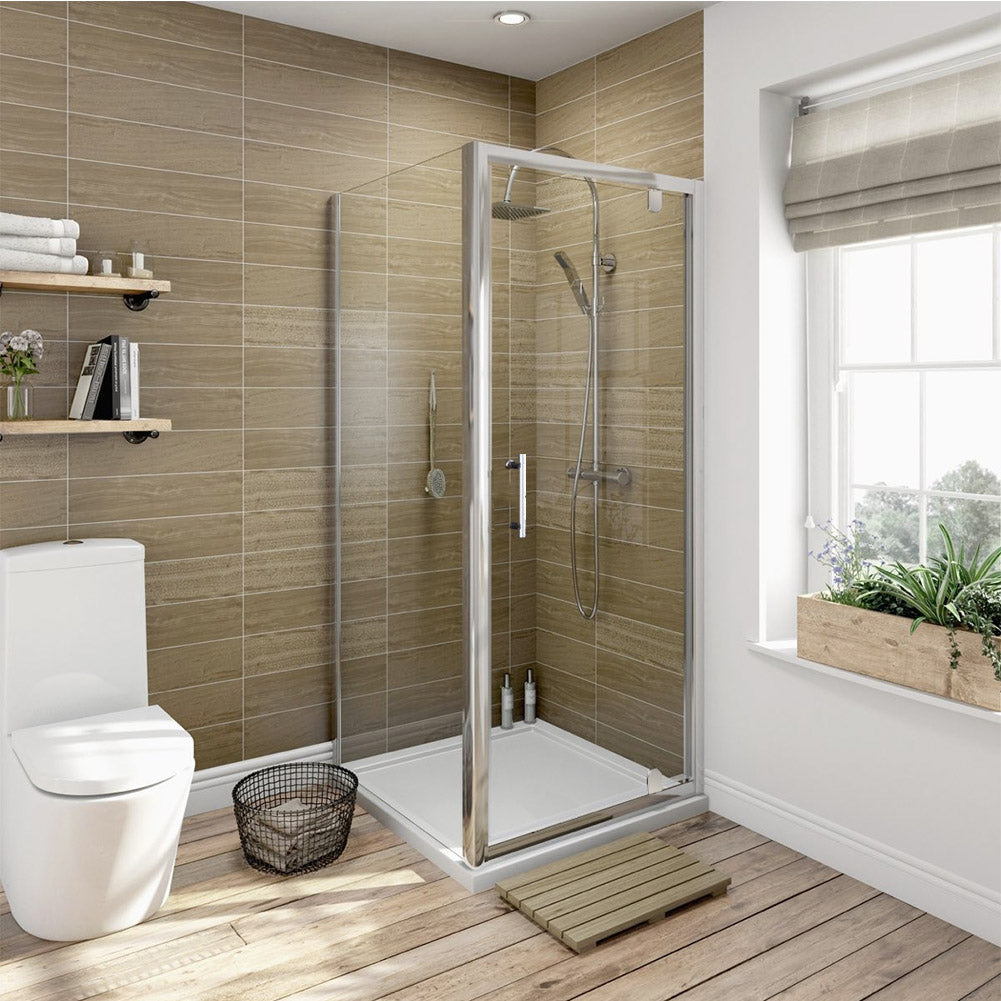Smart Shower Storage Ideas for 2026. Modern Solutions That Transform Small Bathrooms 8 Tiny bathroom shower with creative vertical storage solution