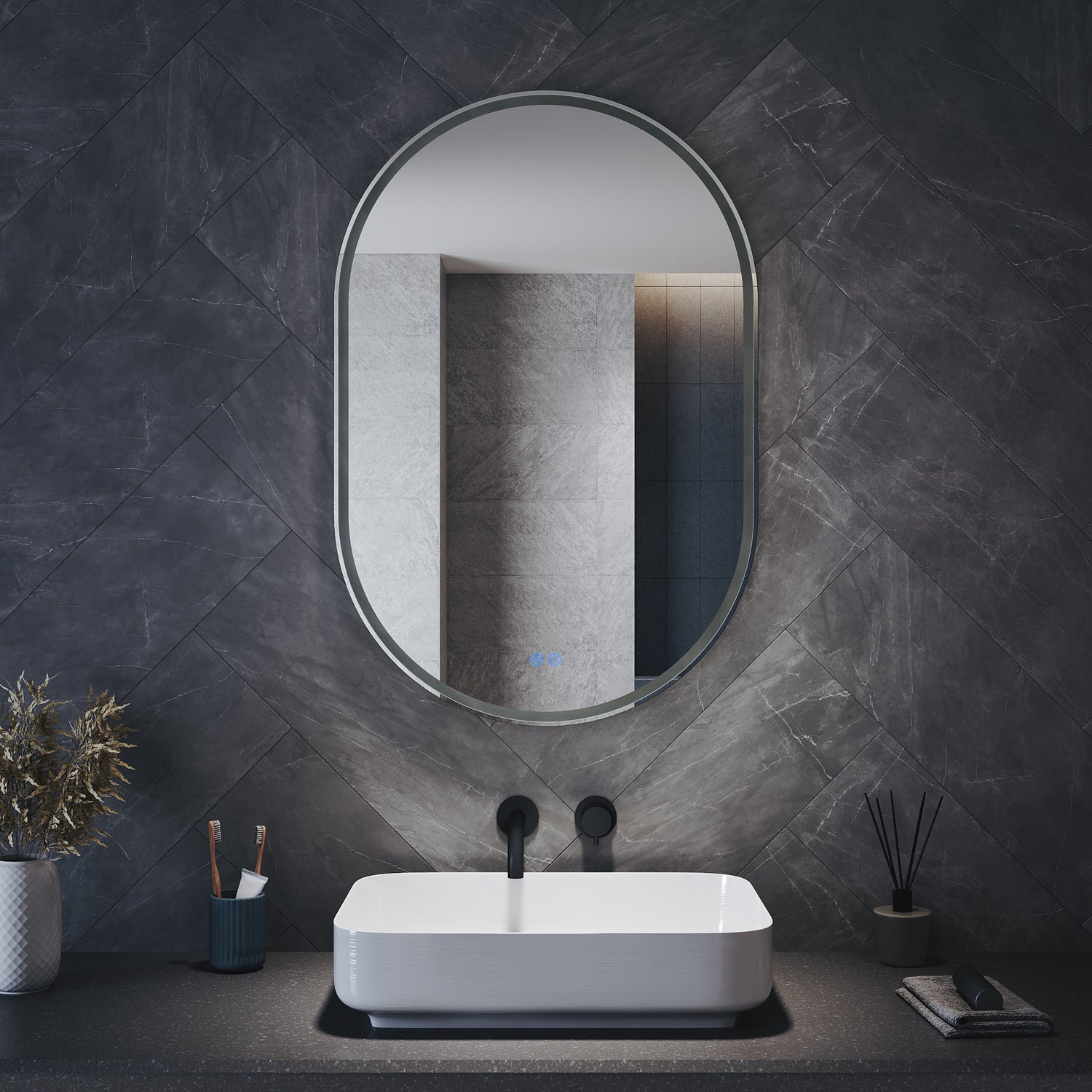 Oval LED bathroom mirror with anti-fog feature and shaver outlet, 800x500x35mm