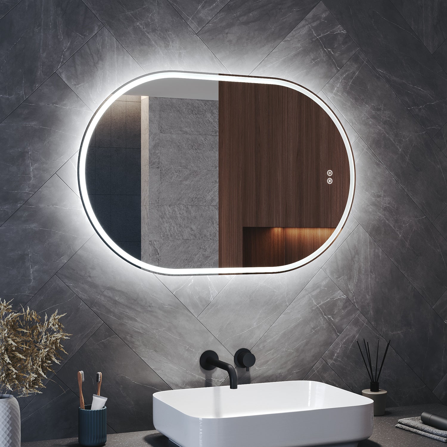 Oval LED bathroom mirror with anti-fog feature and shaver outlet, 800x500x35mm