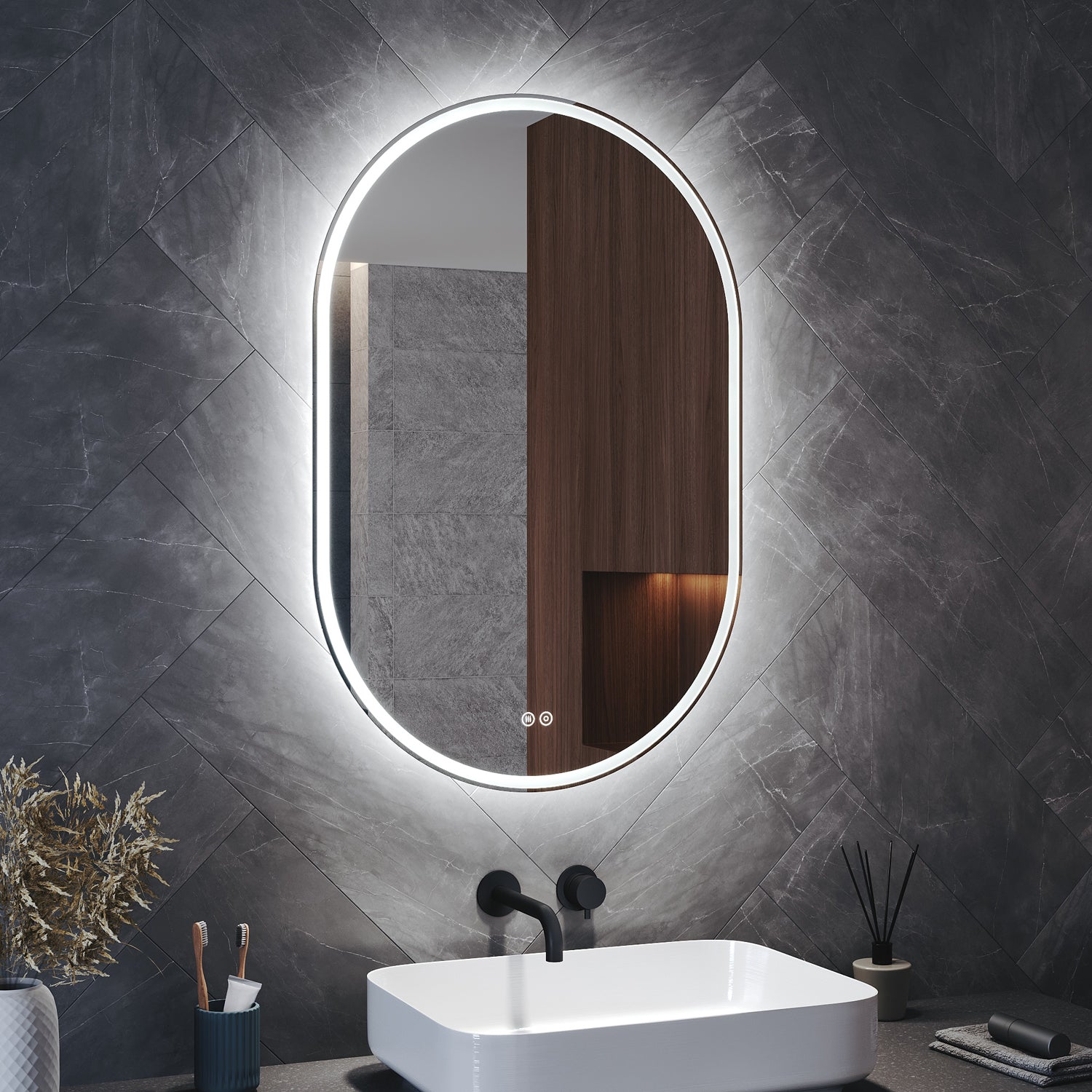Oval LED bathroom mirror with anti-fog feature and shaver outlet, 800x500x35mm